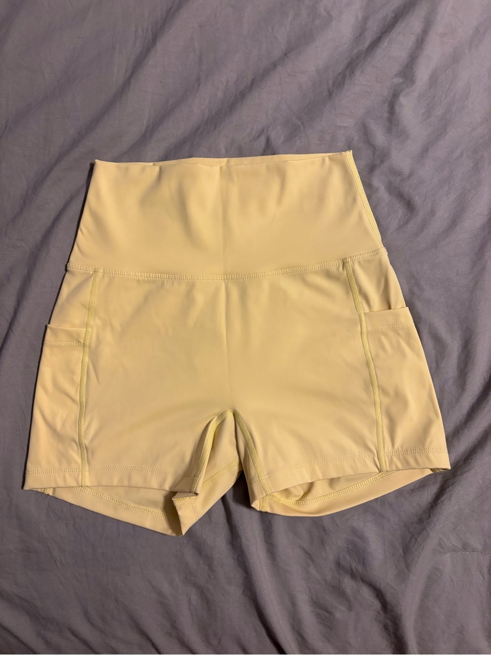 High-Waist Butter Yellow workout shorts